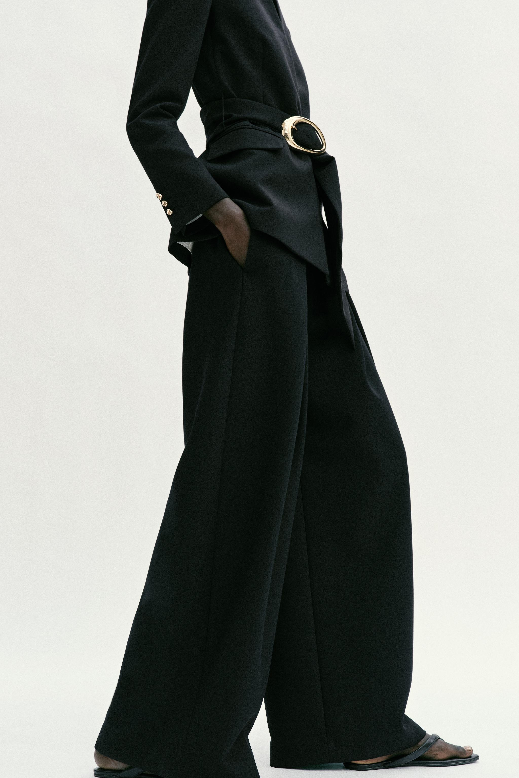 HIGH-WAISTED PLEATED PANTS